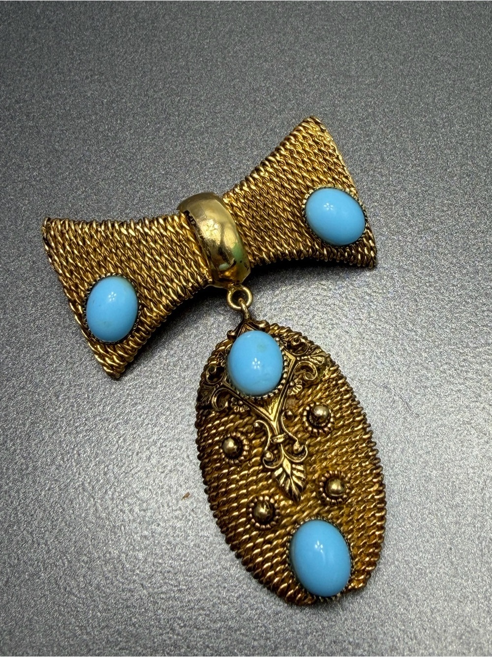 Vintage Revival Style brooch with Blue Cabochons